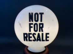 A Not For Resale glass petrol pump globe in good condition.