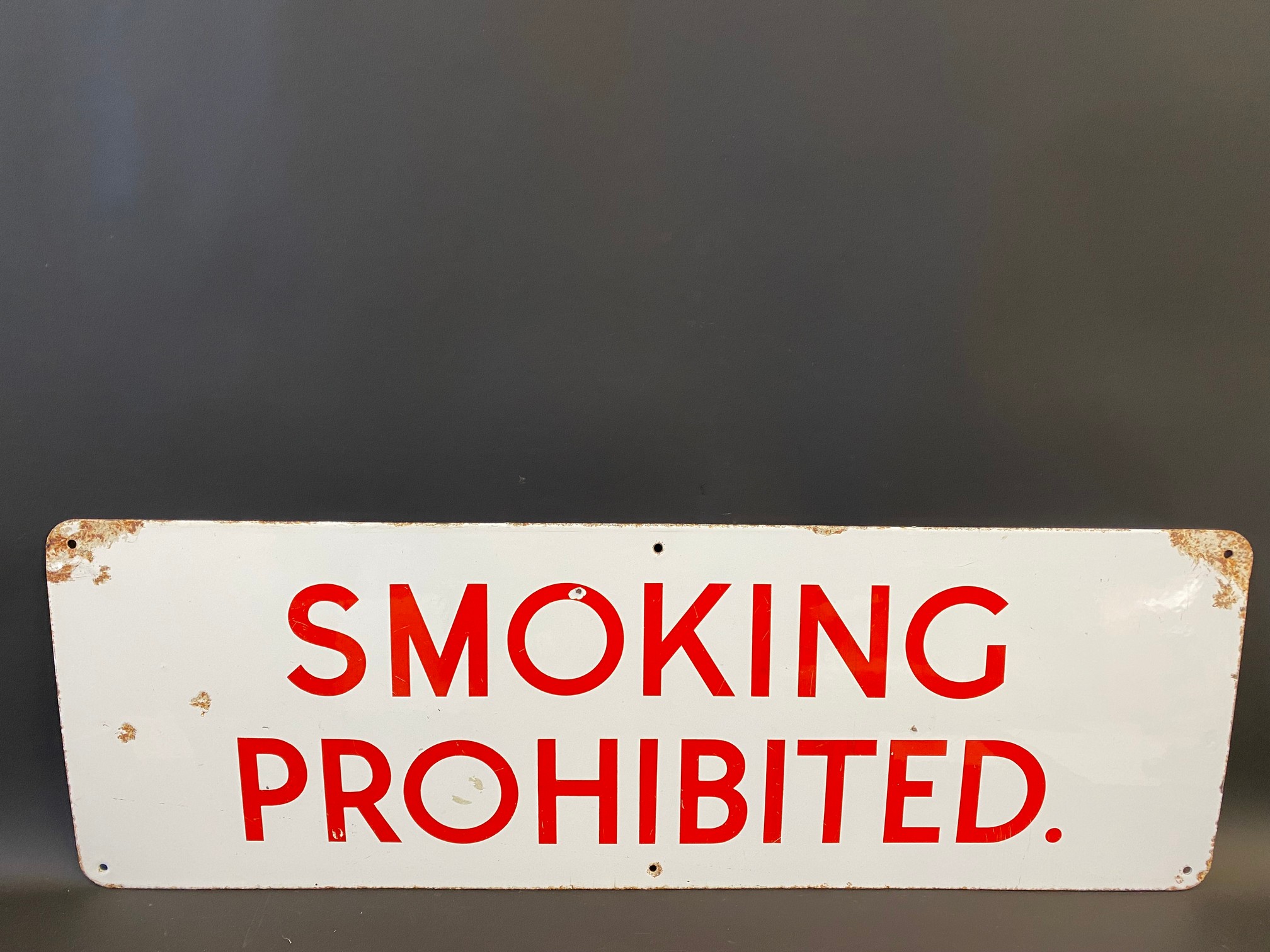 A Smoking Prohibited rectangular enamel sign, 36 x 12".