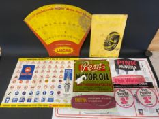 A Pink Paraffin hanging showcard, a Firestone celluloid showcard and various other advertisements