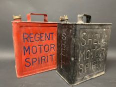 A Regent Motor Spirit two gallon petrol can by Grant and a Shell petrol can.