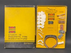 A Dunlop showcard showing the various stages in pneumatic tyre manufacture, in original box of