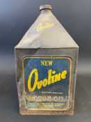 An Ovoline Motor Oil five gallon pyramid can.