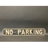 A cast iron No Parking sign, 26 1/4 x 4 1/4".