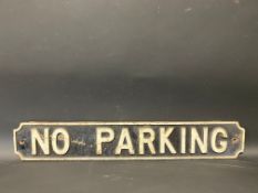 A cast iron No Parking sign, 26 1/4 x 4 1/4".