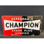 A Champion Dependable Spark Plug Service rectangular enamel sign, dated 1951, 23 x 13".