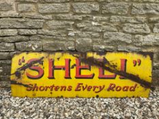 A Shell Shortens Every Road rectangular enamel sign, 54 x 18".