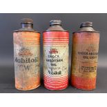 Three Gargoyle Mobiloil cylindrical quart cans.
