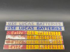 Two Lucas Batteries embossed shelf strips plus four Exide Batteries shelf strips.