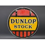 A Dunlop Stock circular double sided enamel sign, 18" diameter.