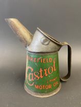 A Wakefield Castrol Motor Oil half pint measure, dated 1929.