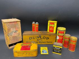 A box of assorted Dunlop tins including a silent salesman wall mounted dispenser.