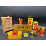 A box of assorted Dunlop tins including a silent salesman wall mounted dispenser.