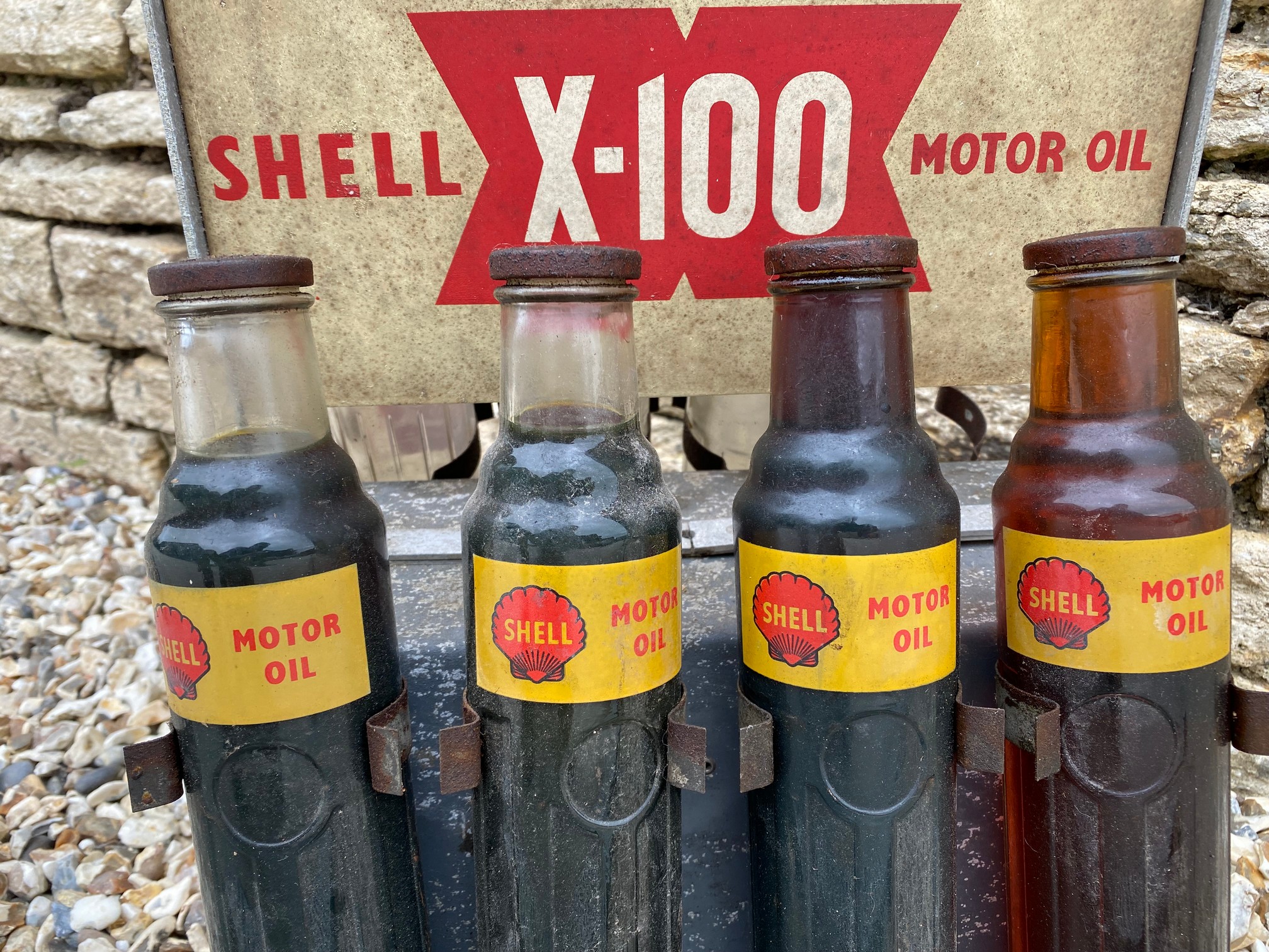 A Shell X-100 Motor Oil double sided oil bottle crate, with five matching Shell pint bottles and two - Image 2 of 4