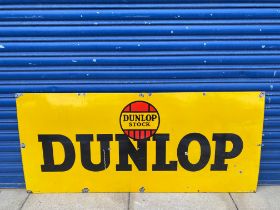 A Dunlop Stock rectangular enamel sign with good gloss, by Jordan of Bilston, 54 x 24".