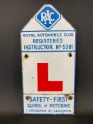 An RAC Registered Instructor L plate enamel sign with 'Safety First School of Motoring, 1