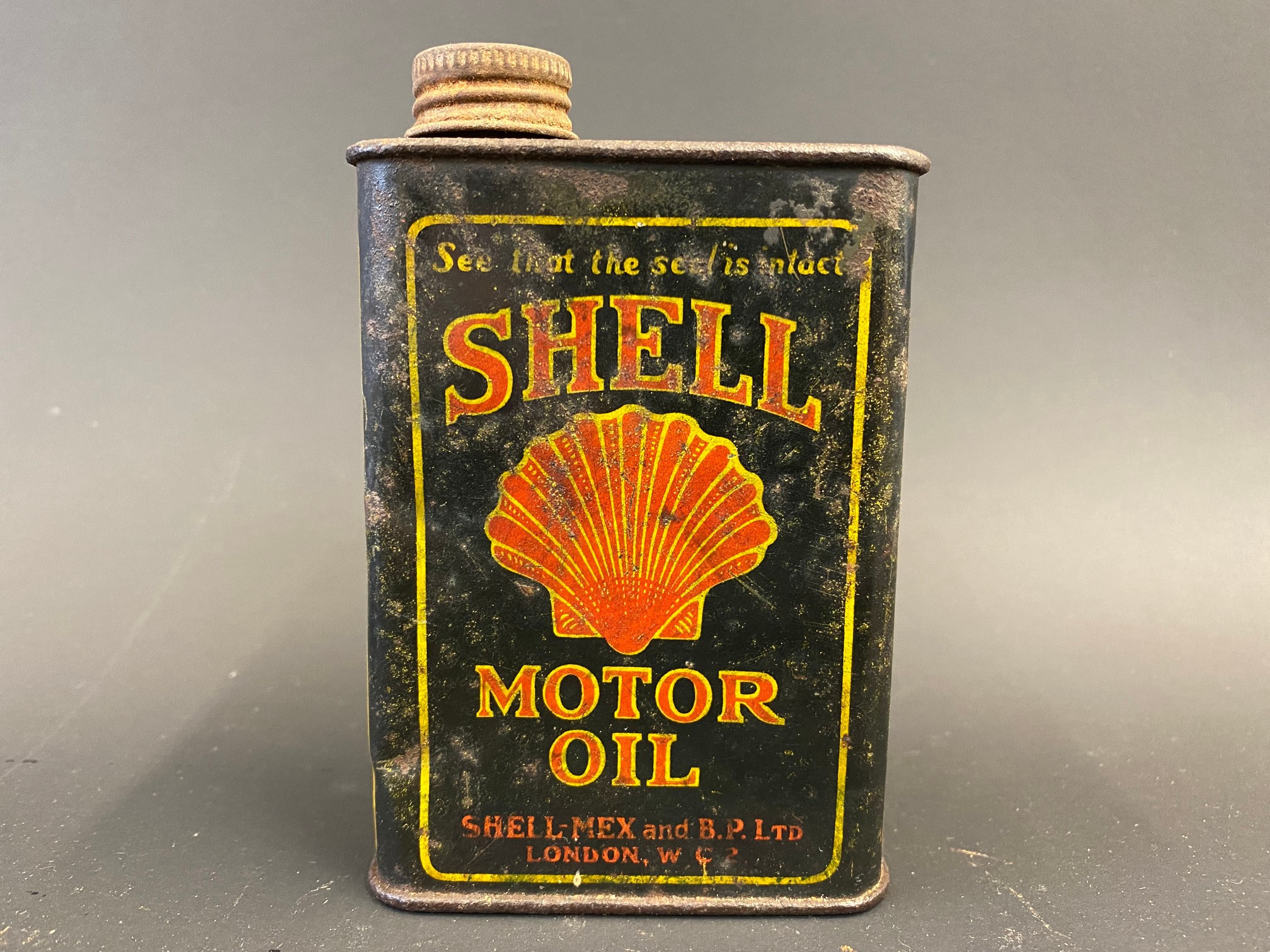 A Shell Motor Oil miniature can.