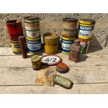 A quantity of grease tins including Mobilgrease No.5, also a Monopole French grease tin etc.