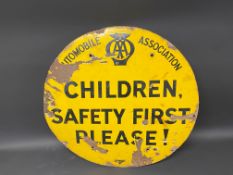 An AA 'Children, Safety First Please!' circular enamel warning sign by Franco, 36" diameter.