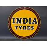 An India Tyres circular enamel sign, 18" diameter.