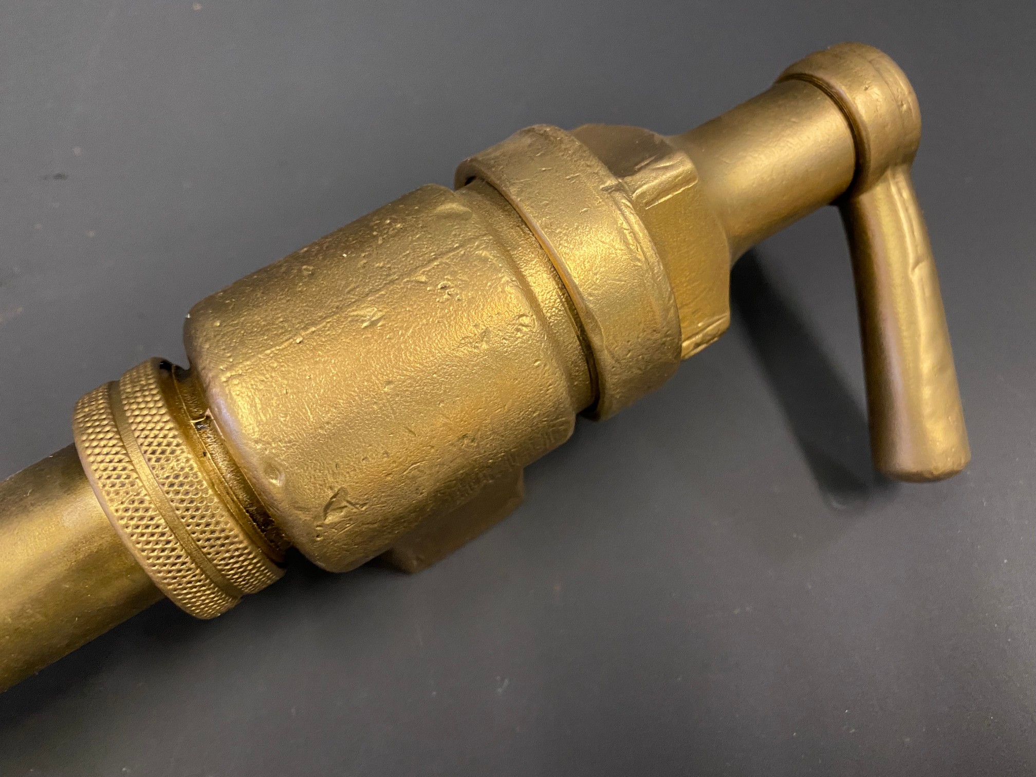 A bronze petrol pump trigger nozzle. - Image 2 of 3