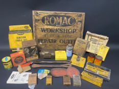 A selection of Romac packaging and tins, stamped tyre levers etc.
