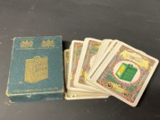 A quantity of Pratt's Perfection Spirit playing cards in a heavy cardboard case, embossed with an