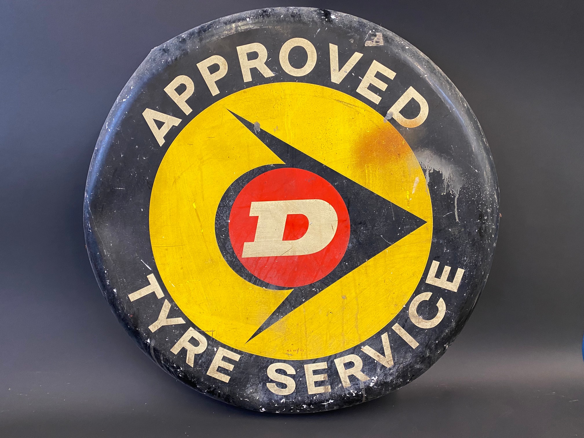 A Dunlop Approved Tyre Service circular tin advertising sign, 30" diameter.