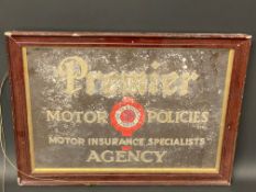 A framed and glazed Premier Motor Policies Agency showcard, 16 x 12".