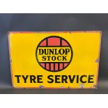 A Dunlop Stock Tyre Service rectangular enamel sign, 30 x 20".