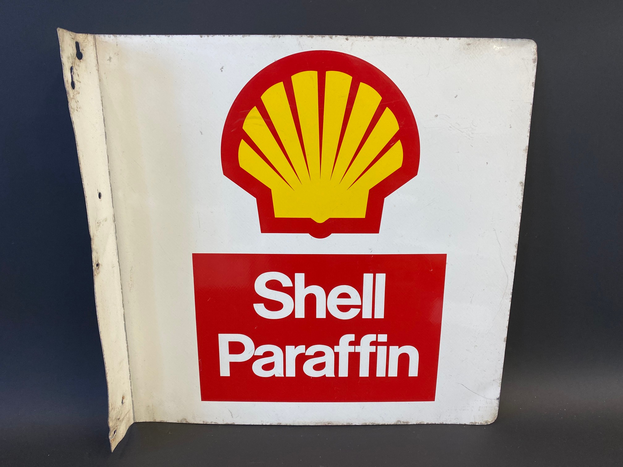 A Shell Paraffin double sided tin advertising sign with hanging flange, 16 x 16".