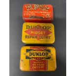 Three different version Dunlop Midget Repair Outfit tins.