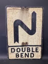A metal road sign for Double Bend, 14 x 21".