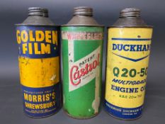 Three cylindrical quart cans including Castrol and Golden Film.