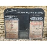 A rare Duckham's Garage Notice Board, still with original paper adverisements attached, 60 x 48".
