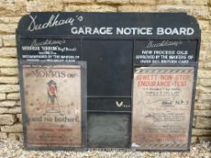 A rare Duckham's Garage Notice Board, still with original paper adverisements attached, 60 x 48".