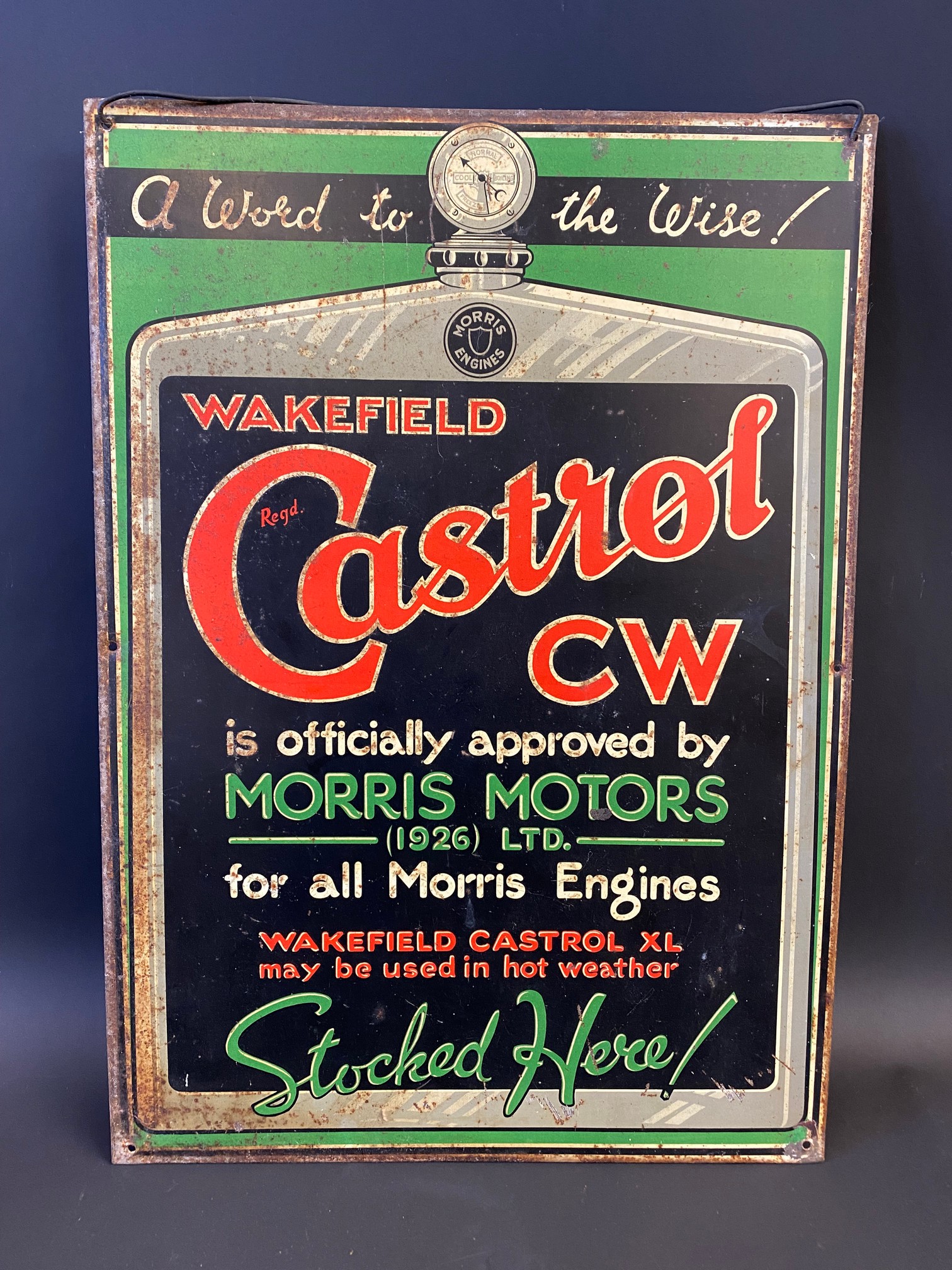 An early Wakefield Castrol 'Officially Approved by Morris Motors' tin advertising sign in very