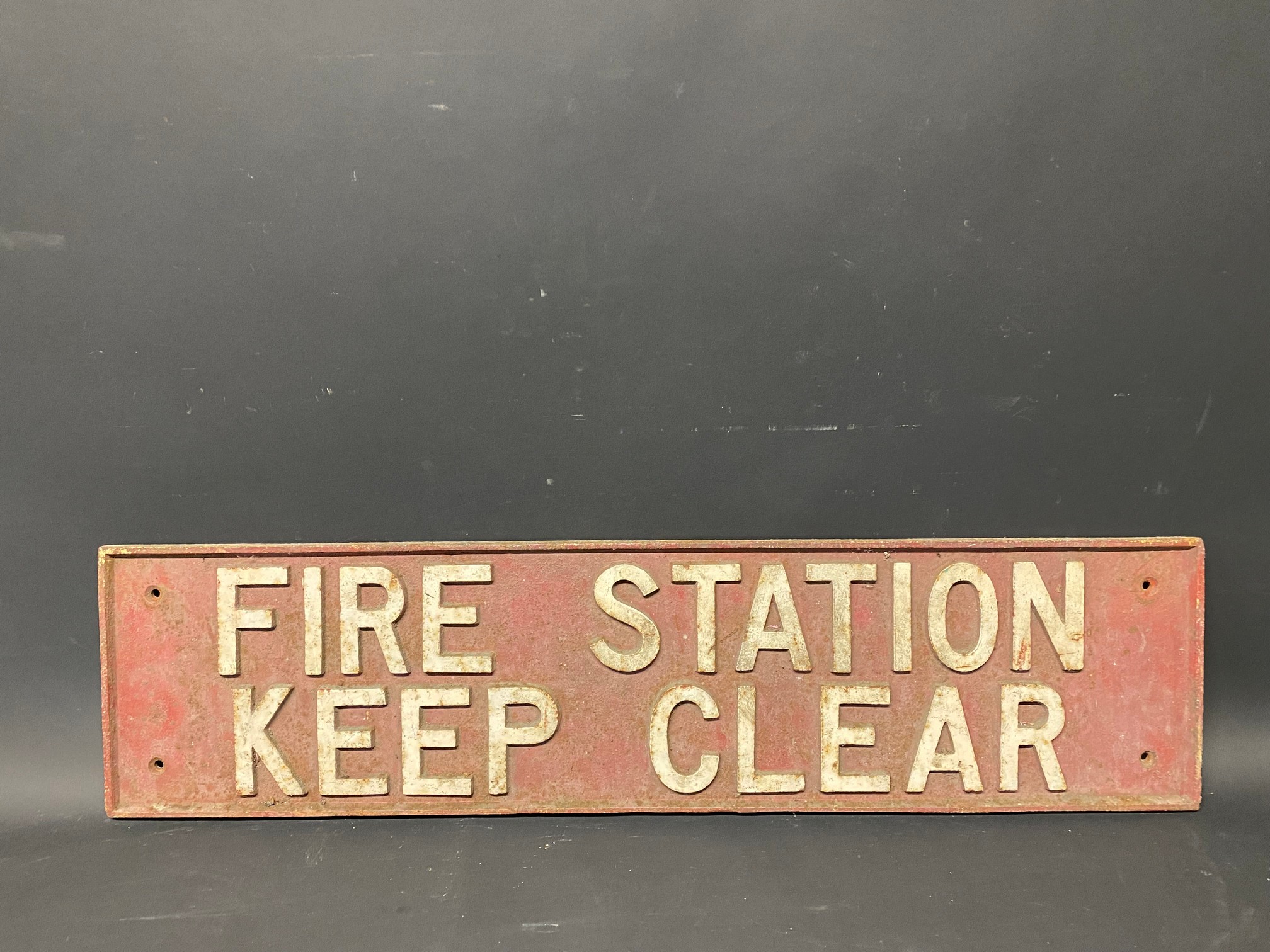 A Fire Station Keep Clear cast iron sign, 30 1/2 x 7 1/2".
