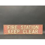 A Fire Station Keep Clear cast iron sign, 30 1/2 x 7 1/2".