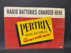 A Pertrax Radio Batteries tin advertising sign, 25 x 17 1/2".