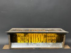A Turog Bread glass fronted advertising box with mirror inside reflecting the lettering, 30 3/4" w x