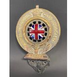 An RAC Associate member's badge with union jack enamel centre, no. N25481.