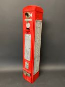 A cigarettes wall mounted vending machine, 5 1/2"w x 29 1/2" h.