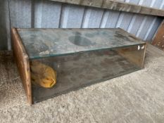 A table top display cabinet, 42" w x 10 1/2" h x 18 1/2" d.