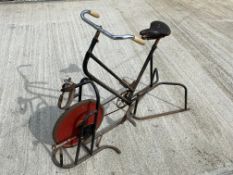 An early exercise bike.