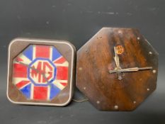 An octagonal wooden wall clock with MG sticker to the dial plus a 1980s MG union jack battery