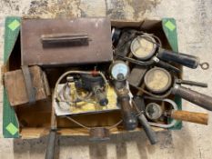 A box of workshop tools, including battery testers.