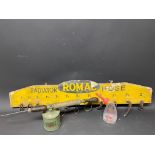 A Romac Radiator Hose dispensing board, a Castrol Lubrication gun and a glass battery filler.