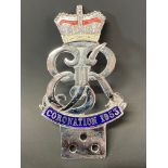 A 1953 Coronation chrome plated and enamel car badge in good condition.