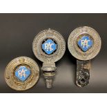 Three different version RAC Associate member badges, all with powder blue enamel centres.