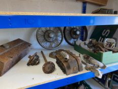 A collection of Austin 7 parts including engine block, wheels etc.